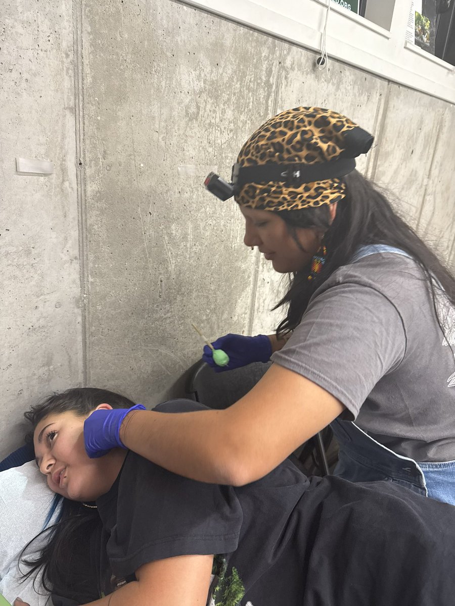 KanahusFreedom's tweet image. My youngest daughter getting a handpoke tattoo by Mina at the traditional indigenous tattoo gathering in Rapid City, SD Oglala Lakota Territory