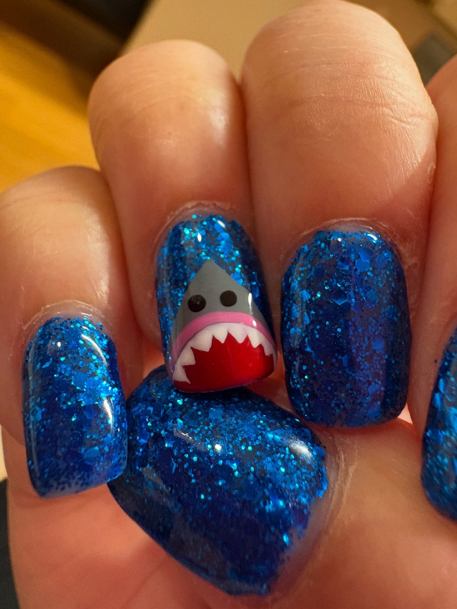 divatura's tweet image. Shark week ready!