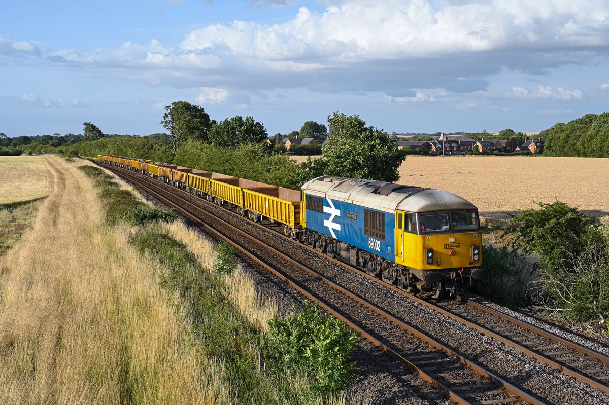 69002 (ex 56057 / 311) 'Bob Tiller CM&amp;EE' approaches Langham Junction on 14th July 2025 working the 6L15 17:51 Toton North Yard to Whitemoor NDS service.

<a href="/GBRailfreight/">GB Railfreight</a> <a href="/networkrail/">Network Rail</a>