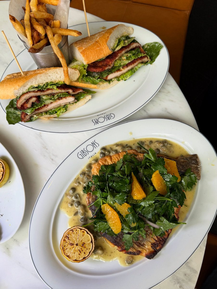 Midday perfection on a plate. || Mediterranean Branzino and a Chicken Caesar Panini…because lunch should never be boring.