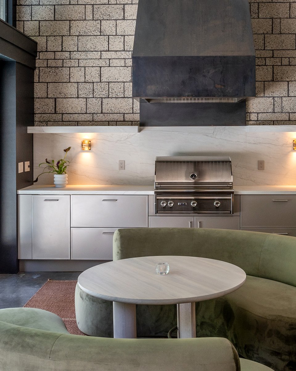 For a cozy poolside retreat, look no further than Danver Outdoor Kitchens. This elegant pool house outdoor kitchen showcases warm, neutral hues for a perfectly inviting space. 
danver.com