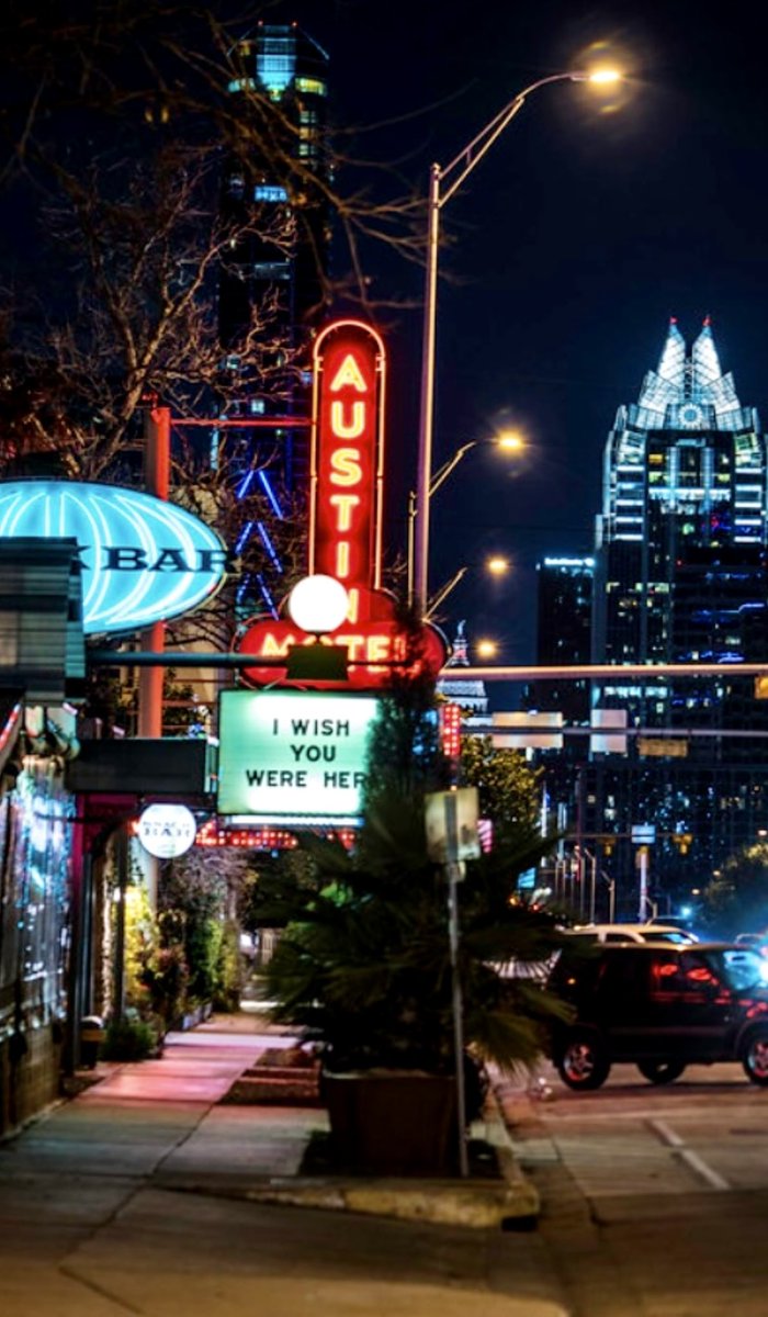 end_record's tweet image. Austin Motel keeping it real and Pink.