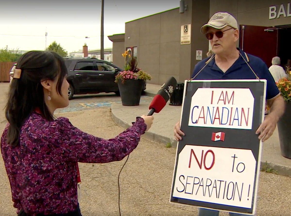 valdombre's tweet image. Protestor outside Danielle Smith's Alberta Next town hall in Edmonton:
