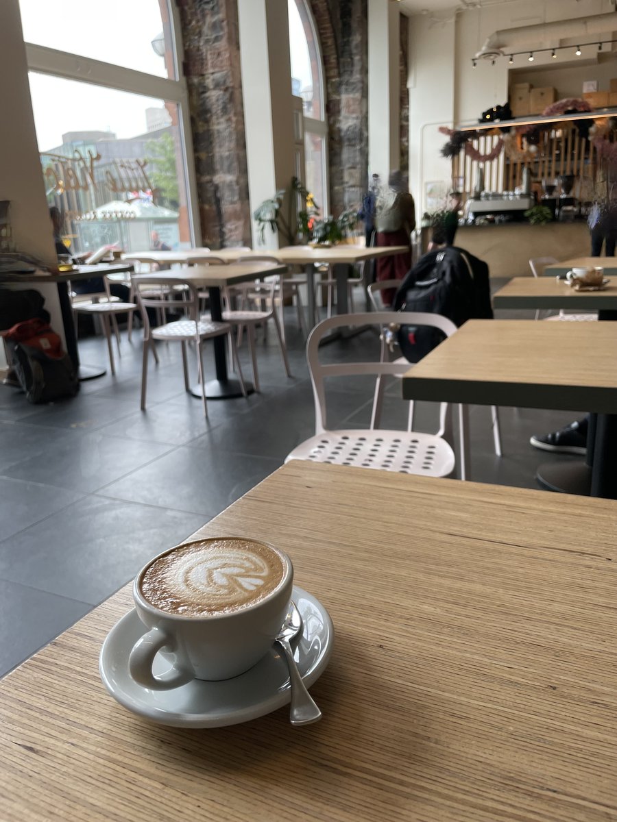 I was watching the morning rain shower from the comfort of this cozy café.
