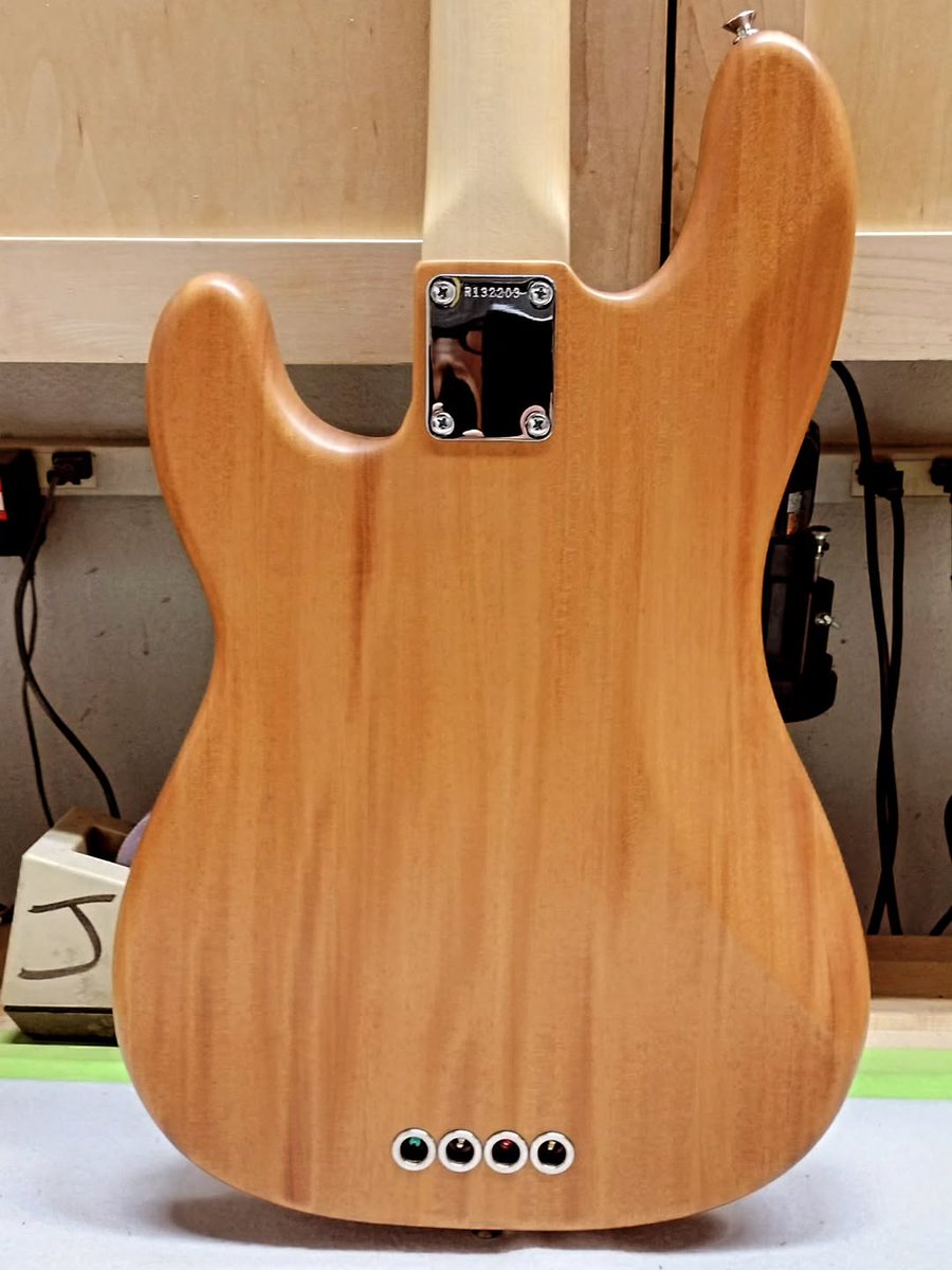 Fender's tweet image. We're loving this satin finish '60s Precision Bass from Jason Smith — headed to Fender Custom Shop in Japan. It features a Mahogany body and a figured Koa top. What mods would you add to your custom Bass?