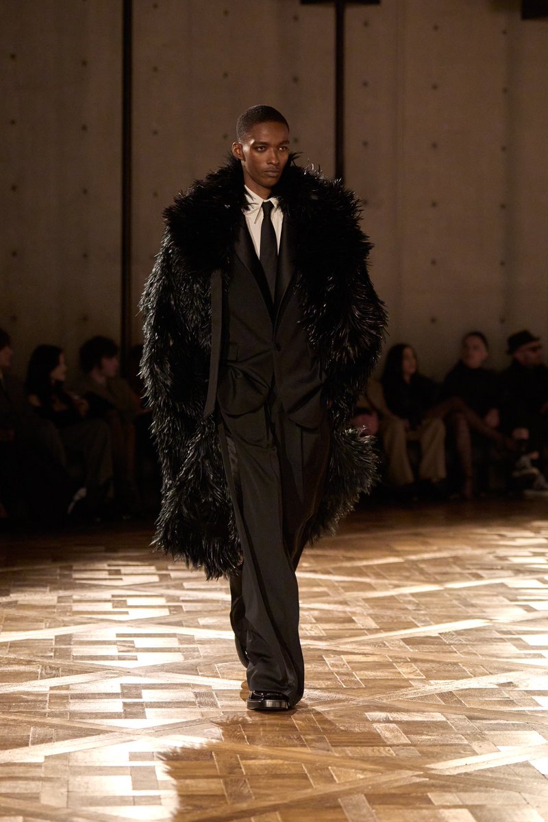 This Saint Laurent coat, made from silk organza and feathers, is