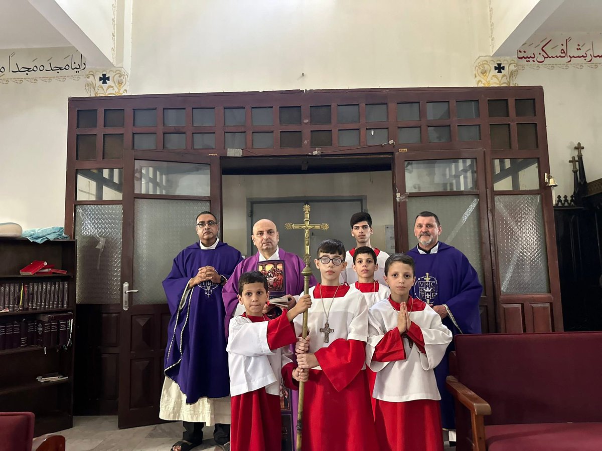Mass tonight in the bombed-out remains of the Holy Family Church in Gaza targeted by Israel today - the way the young lads cling to that Cross tells you everything you need to know about this community. 💪