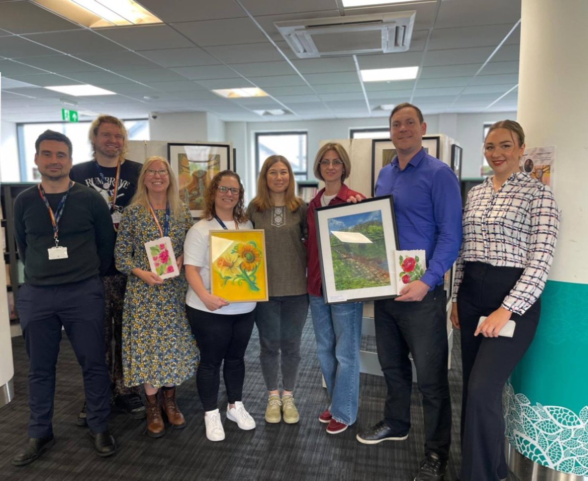 pritchar13's tweet image. On the final day of her art exhibition in @CaerphillyLib , the talented Олеся Міфтахова presented two gifts. One painting is on display in the library. The painting in my hand has made its way to the Council offices in Ty Penallta.