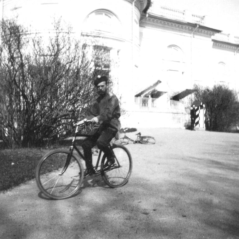 Kiefer_Wool's tweet image. Nicholas II riding his bicycle on the grounds of the Alexander Palace, 1914