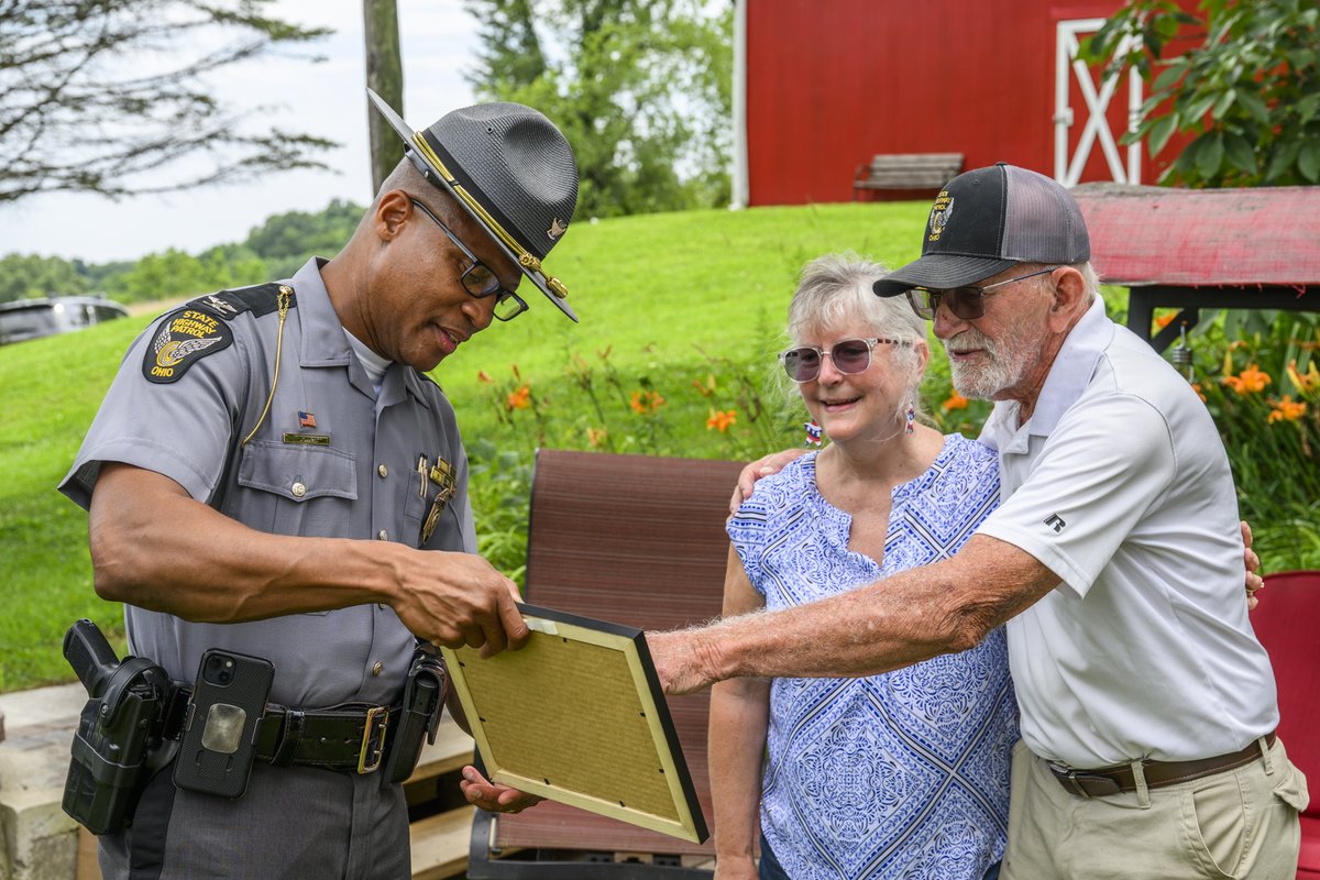 OSHP's tweet image. Yesterday, Colonel Charles A. Jones, Patrol Superintendent, met with Larry Kornmiller, the local barn owner who opened his doors for our Best Looking Cruiser Contest entry. His generosity set the perfect scene.
