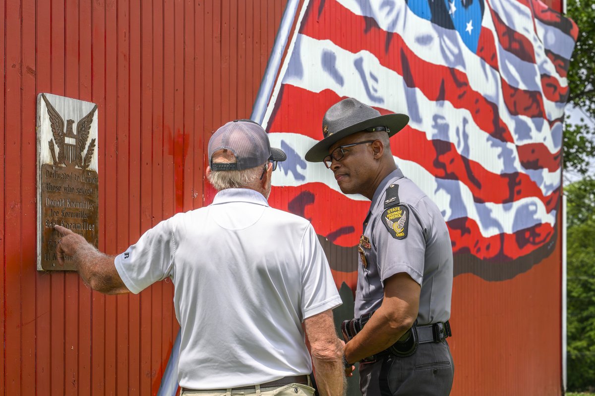 OSHP's tweet image. Yesterday, Colonel Charles A. Jones, Patrol Superintendent, met with Larry Kornmiller, the local barn owner who opened his doors for our Best Looking Cruiser Contest entry. His generosity set the perfect scene.