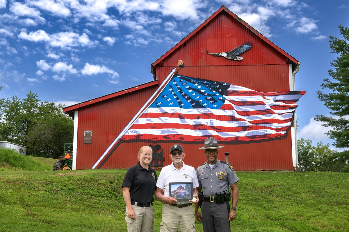 OSHP's tweet image. Yesterday, Colonel Charles A. Jones, Patrol Superintendent, met with Larry Kornmiller, the local barn owner who opened his doors for our Best Looking Cruiser Contest entry. His generosity set the perfect scene.