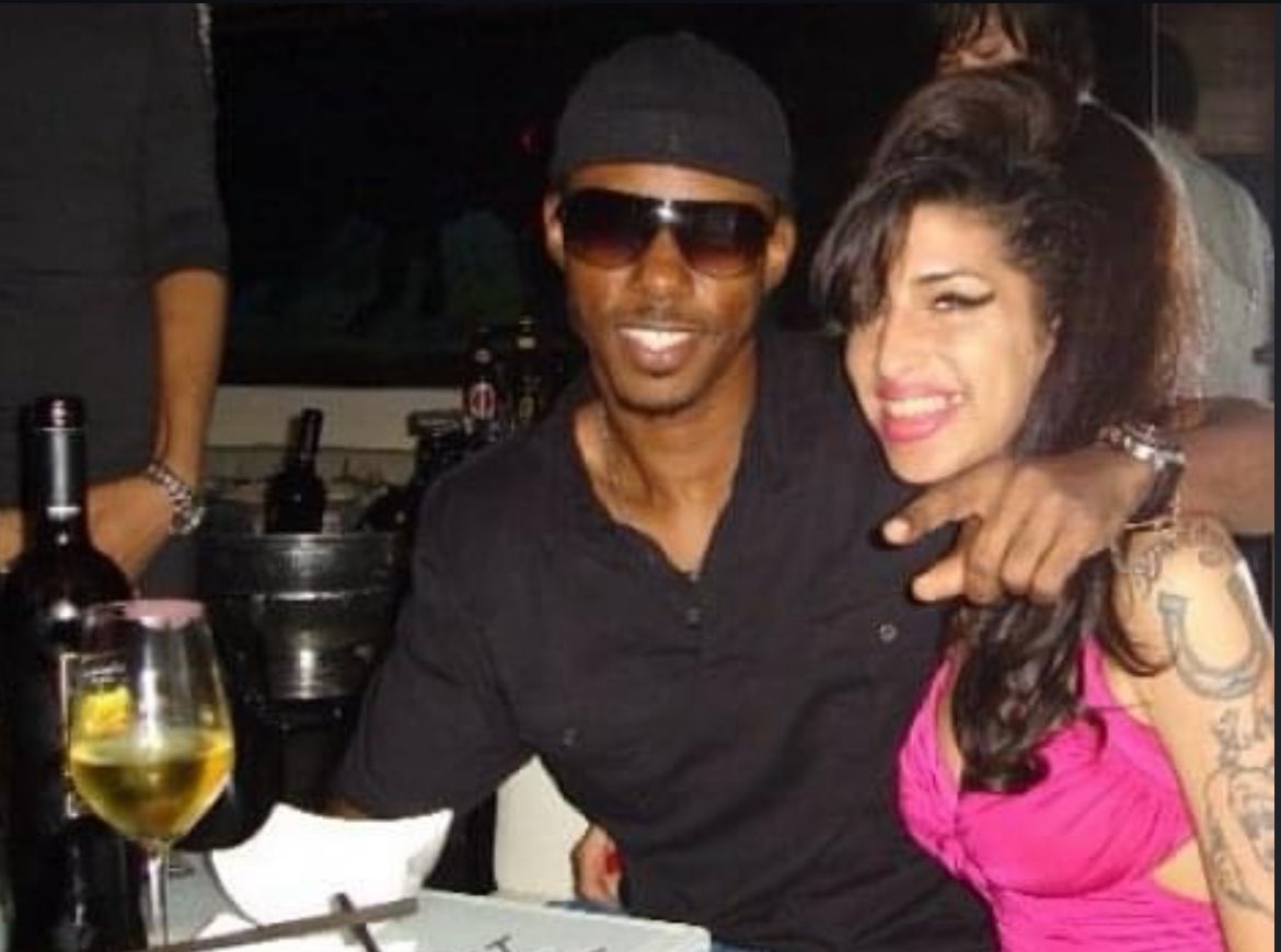 dailyamyw's tweet image. amy with damian marley to celebrate his birthday at the kyashii club ( 2010 )