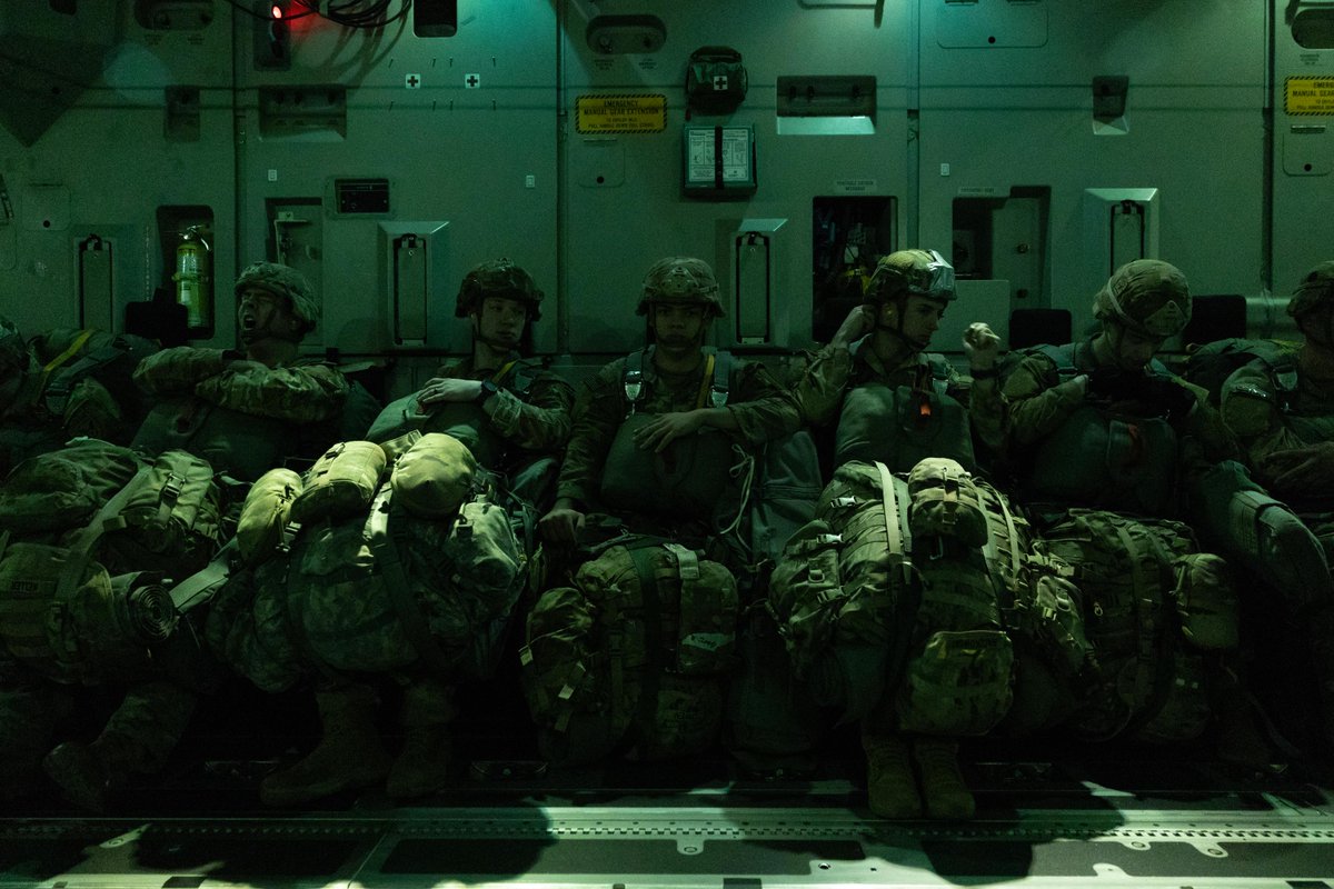 DefenceAust's tweet image. Night Jump 🌙🪂 Under the cover of darkness, @USArmy paratroopers from the 11th Airborne Division took to the skies over 📍 Charters Towers, QLD, executing a night airborne insertion from an @AusAirForce C-17A Globemaster III as part of Exercise @TalismanSabre 2025.
#YourADF…