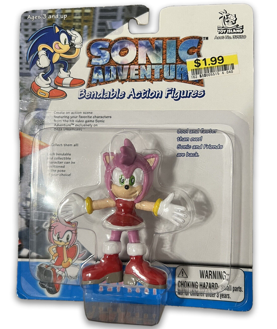 The packaging for the Amy Rose 'Sonic Adventure' bendable action figure,  released by Toy Island in 2000. Photo by chronicthehemphog . These would be  re-released in 2004 under 'Sonic X' branding