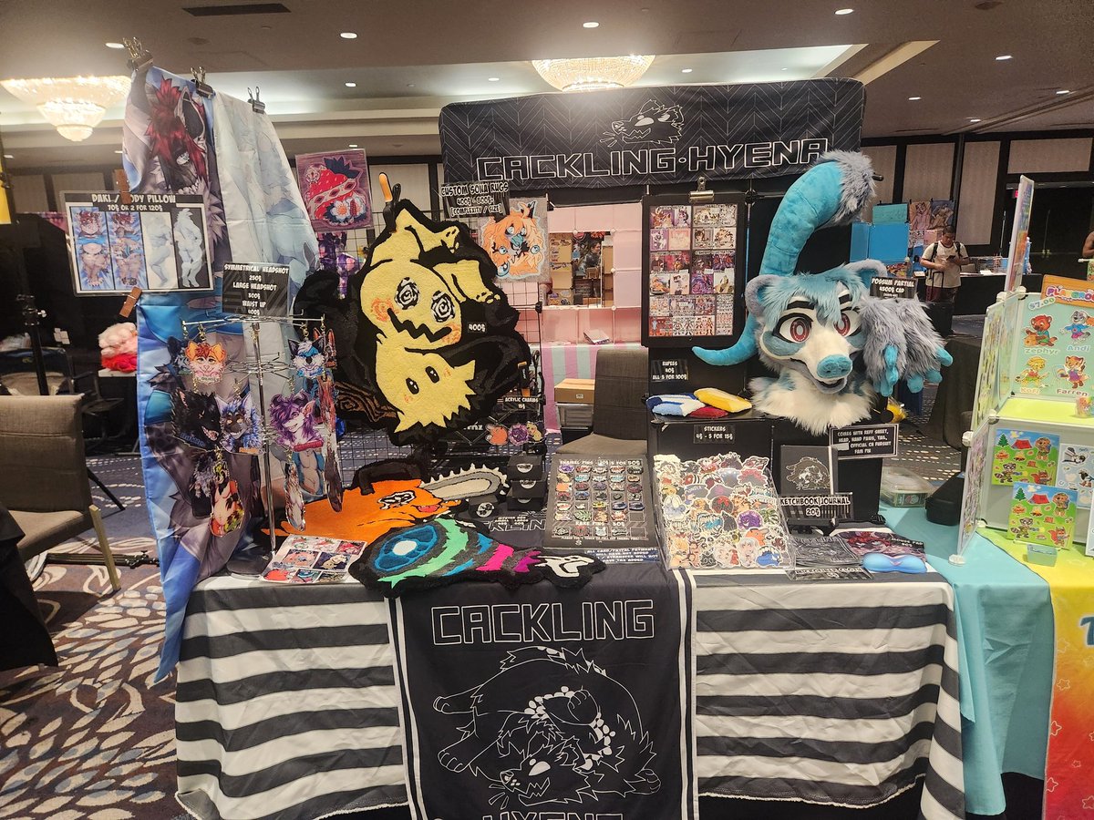 CacklingHyenaa's tweet photo. Table is finally all set up in the dealers den at #fureh2025!!! Im so excited. First time here and excited to meet you all! https://t.co/om4XTfJZuz