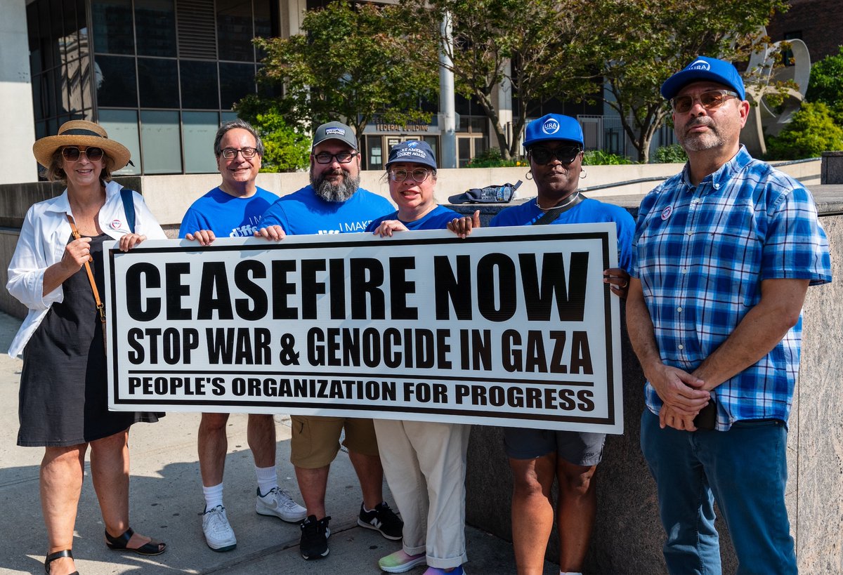 AFTNJ's tweet image. TURNING UP THE HEAT: AFTNJ’s Jennifer S. Higgins and Ryan Williamson with @union1766 and Kean Federation of Teachers members outside the Peter W. Rodino Jr. Federal Building in Newark for today’s #GoodTroubleLivesOn rally and march. @AFTunion