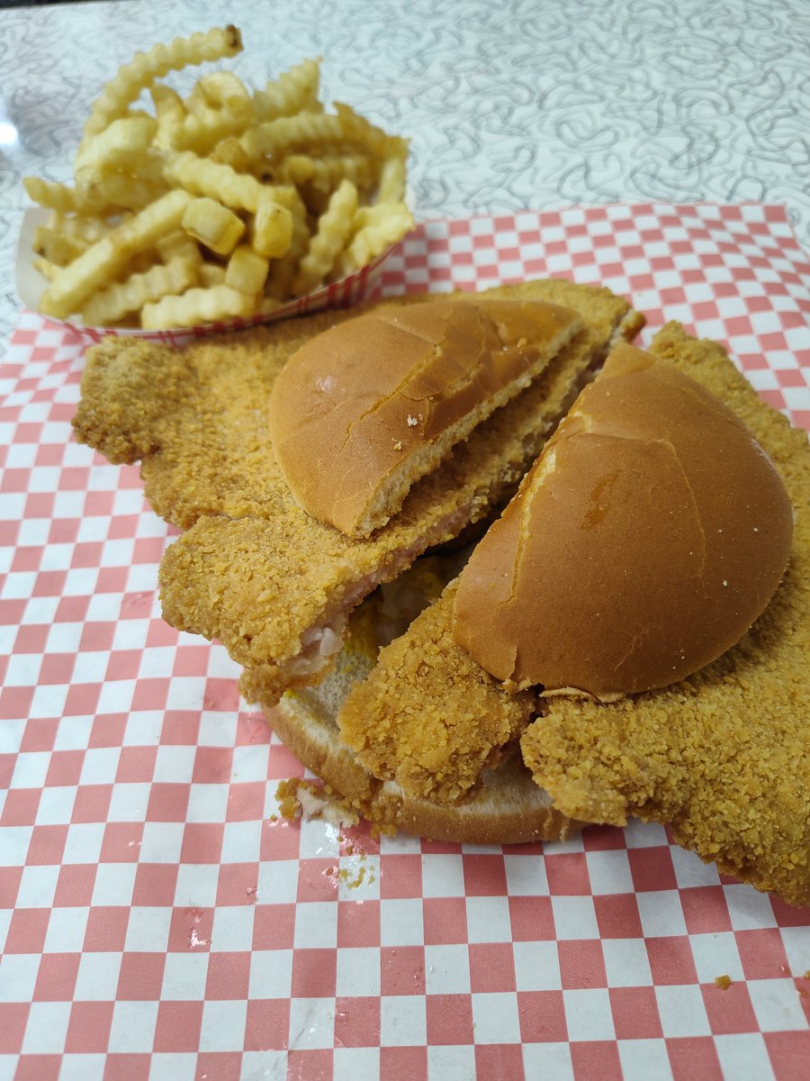TheMRR7's tweet image. Dinner at Smitty&apos;s Tenderloin Shop in Des Moines, IA--a King-sized Breaded Tenderloin Sandwich and French Fries.  Smitty&apos;s was on Man vs. Food (the Casey Webb years) back in 2016, but this was my first visit.
