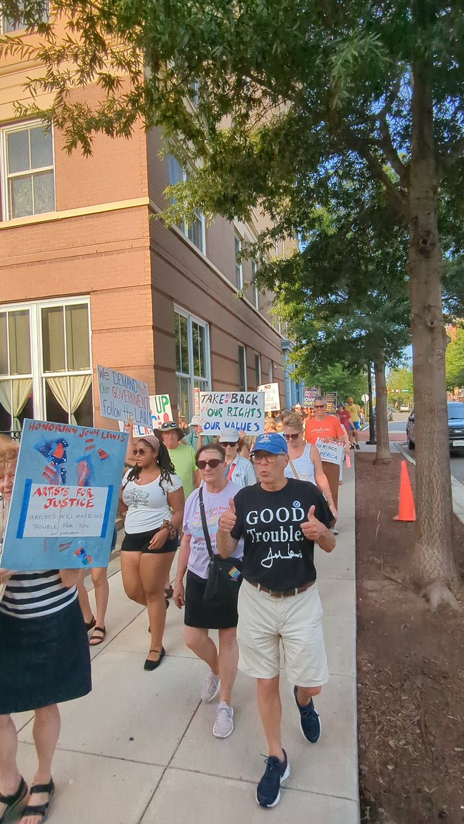 SEIU's tweet image. #SolidaritySummer isn’t over yet! Across the country, people took action this evening for the 5-year anniversary of Rep. John Lewis’ passing. Working people are speaking out against the injustices of the Trump Administration. #GoodTroubleLivesOn