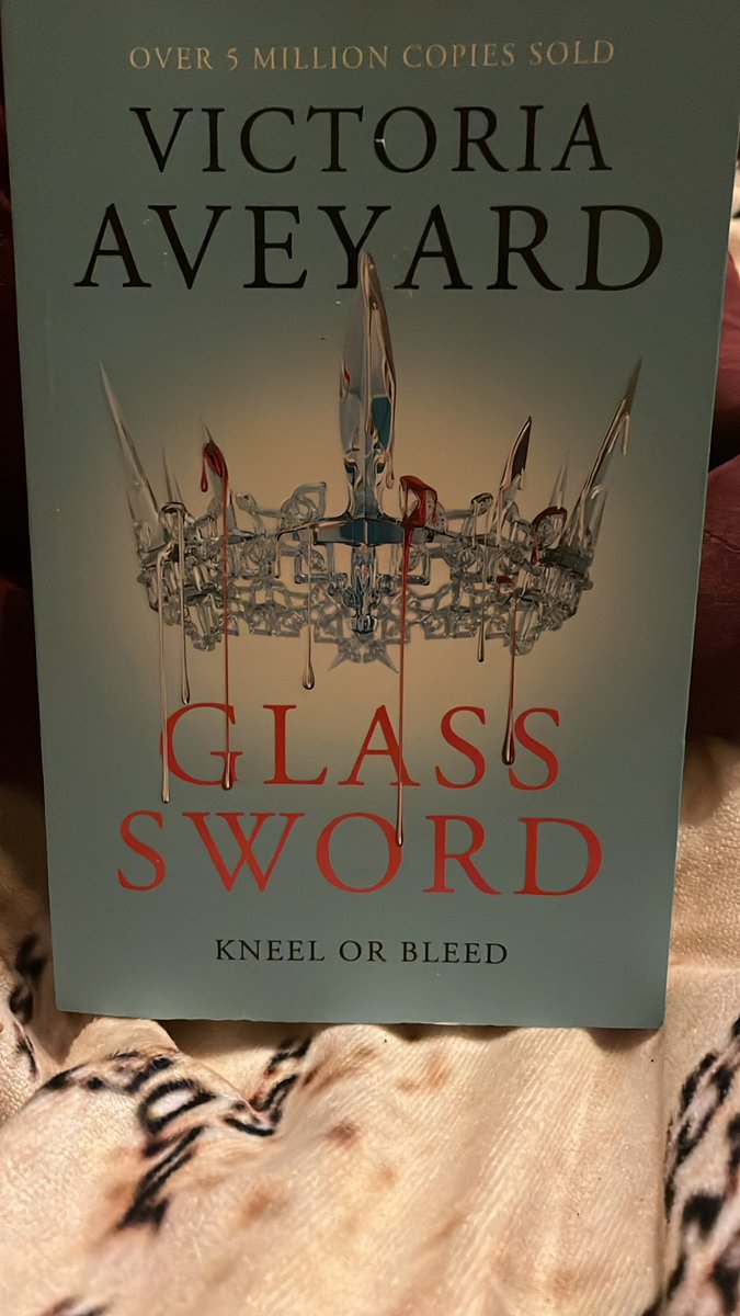 New day , new read #GlassSword by Victoria Aveyard - love the book cover #amreading