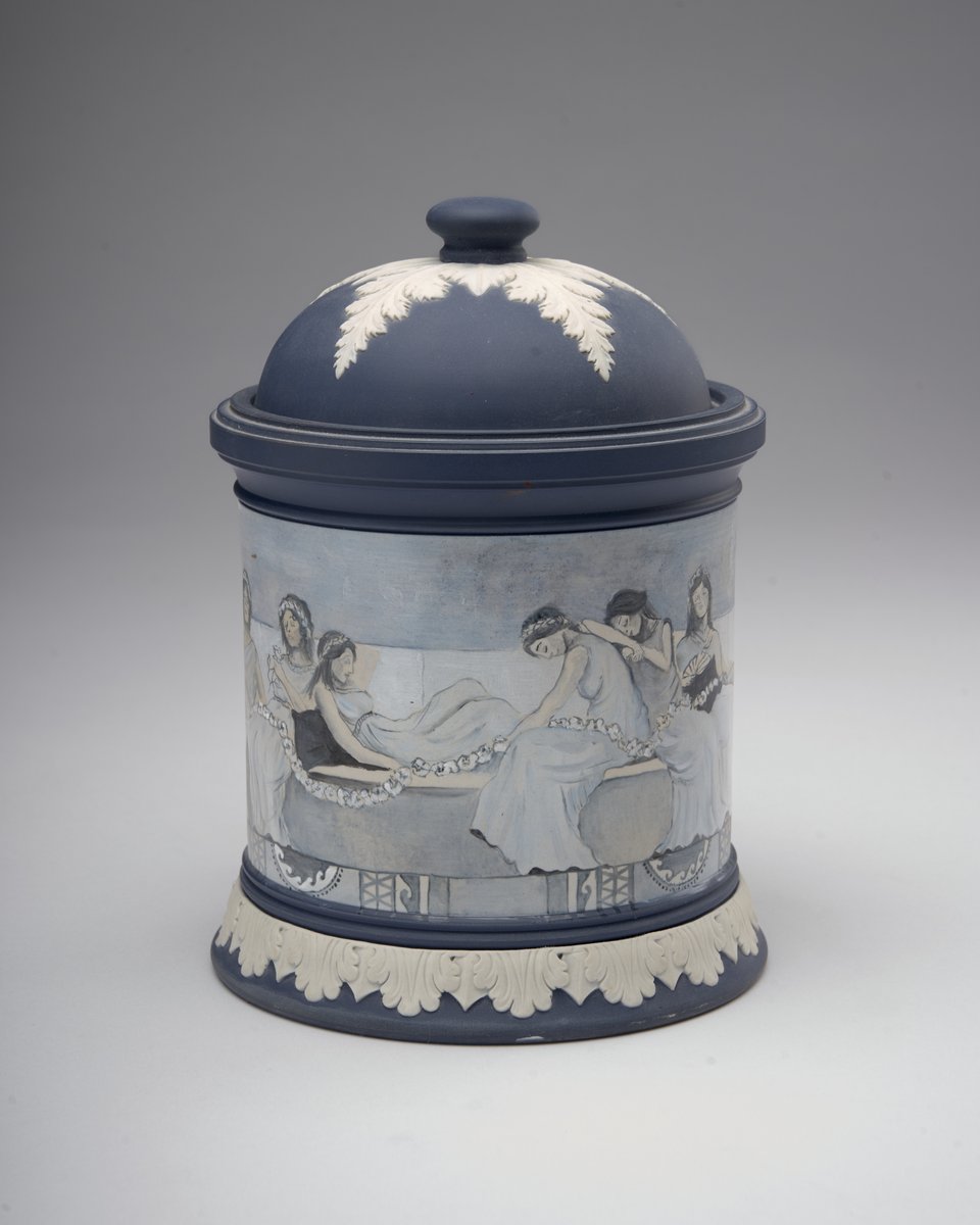 This week’s #FridayFinds spotlights a pair of jasperware jars, each adorned with a continuous hand-painted scene that wraps around the circumference. Both jars were painted by Matthew J. Riley, who worked at the Wedgwood Factory at Barlaston from 1996 to 2006.