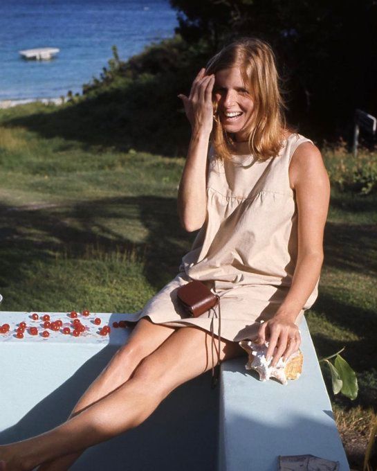 Paul and Linda McCartney taking photos of each other while on vacation in Antigua, 1970: