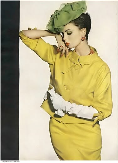 TheVFG's tweet image. Dorothea McGowan in golden yellow dress and jacket of Onandaga grained silk, by Travilla, and hat of pea-pod chiffon bows by Lilly Daché.
Photo by Irving Penn, 1961. Thanks to Midcentury Fashion for sharing.
