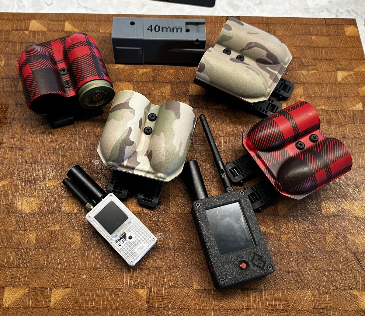 Copper_Shop_419's tweet image. Pocket dump: 40mm pump bcg some 40mm holsters from three toed carry solutions and a couple marauders from just call me koko