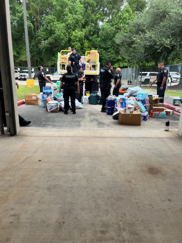 D2 staff hard at work loading a final delivery for the Kerr County relief effort.