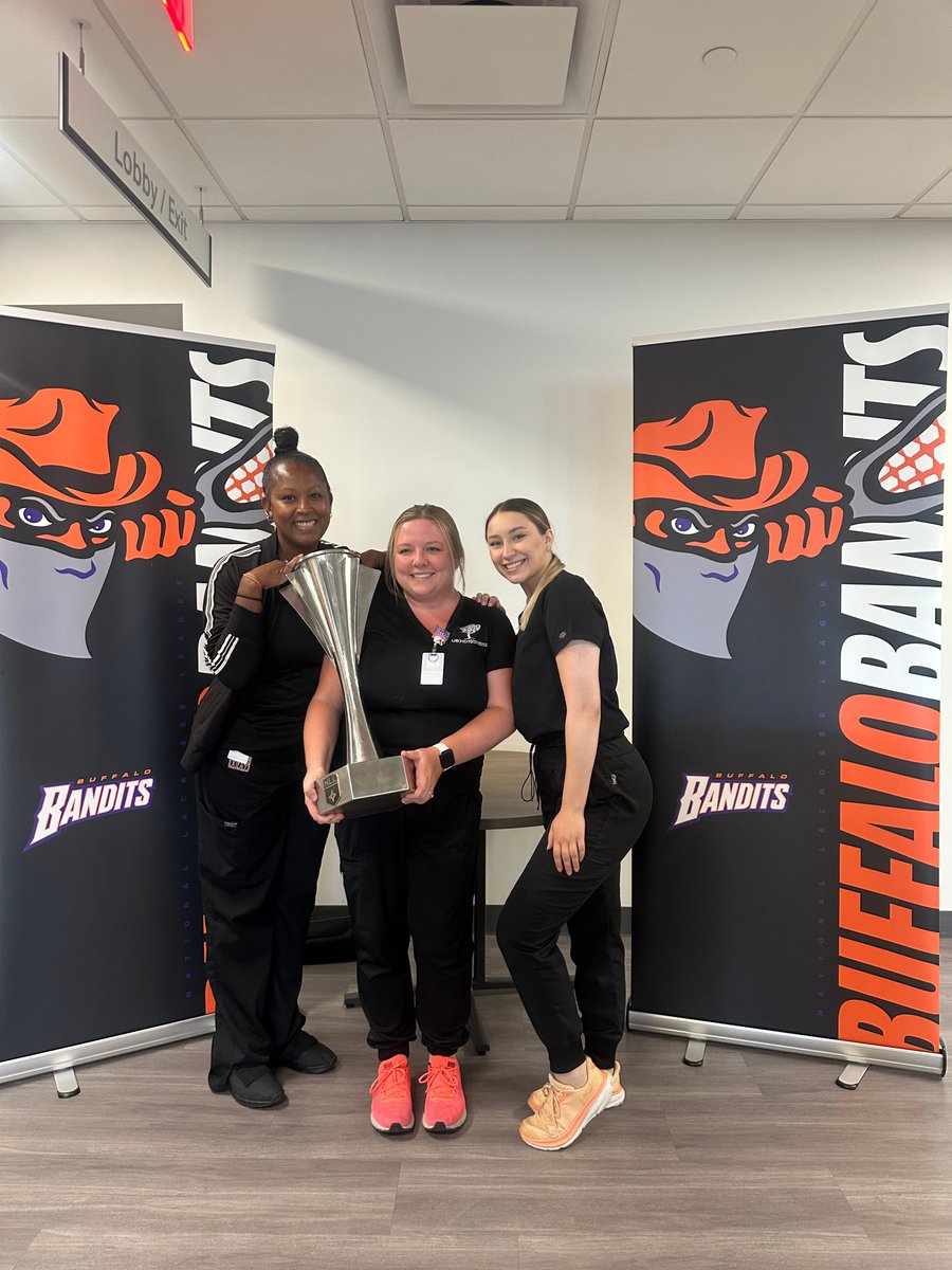 UBMDOrtho's tweet image. Our team had a blast snapping pics with the #NLLCup this week! 📸🏆 Fresh off their 3rd straight title, the @NLLBandits brought the cup to our 716 Health location. Staff &amp;amp; patients got up close with this coveted trophy!

Proud to be their #TeamDocs. 🧡🖤 #NLLChampions #Banditland