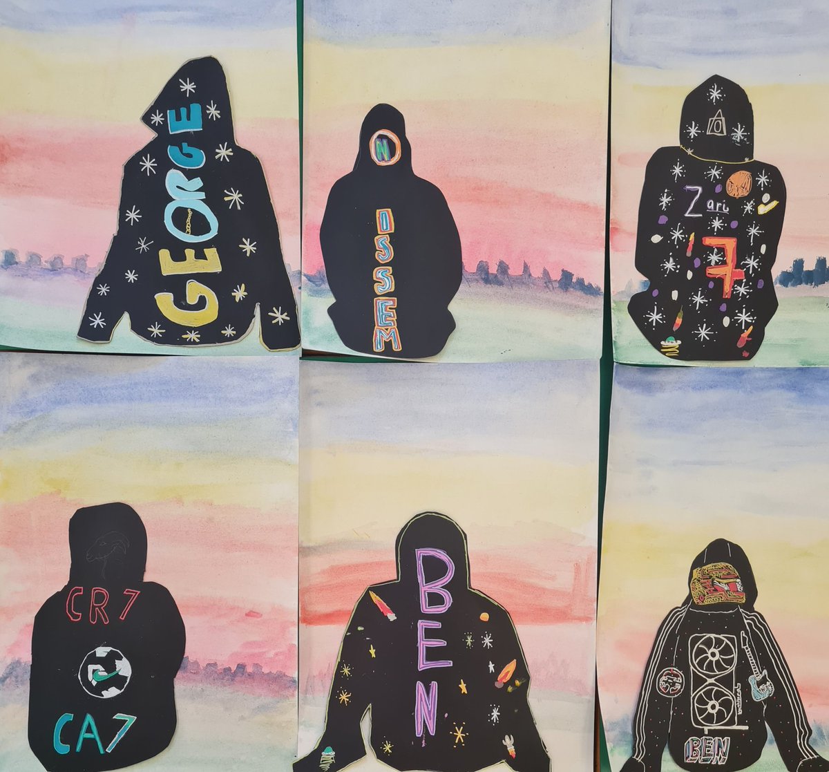 Yr 6 boys after school art club finished pieces. They used acrylic pens to show their interests and hobbies on their hoodie. Then they used watercolour to paint the sunset. Most thought they couldn't do art. This summer, why not make art your superpower?