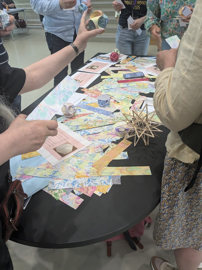 msmathcomp's tweet image. The @BridgesMathart conference traditionally closes with &quot;#Family Day,&quot; an offer of a collection of #arts and #crafts activities, openly and freely accessible to the public. Here, the community shares their love of #MathArt and #IllustratingMath with the local folks.