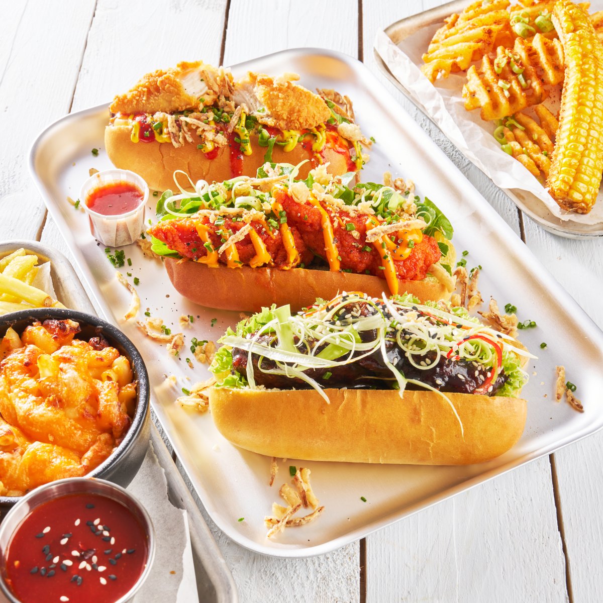 Three on-trend Chicken Strip Dogs designed to impress every appetite 🌭

Featuring The Classic, The Hot Honey and The Korean BBQ, crafted with a selection of our Meadow Vale Mini Fillets. 

See the full menu Idea here > meadowvalefoods.co.uk/about/menu-ide…

#Chicken #MenuIdeas