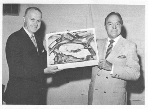 USGPO's tweet image. In July 1969, entertainer Bob Hope stopped by the GPO Traveling Bookstore at the Summerfest in Wisconsin where GPO had an exhibit of the recently released Marine Corps Vietnam Combat lithograph prints.
GPO's Public Information Specialist George McFarlane presented a print to…