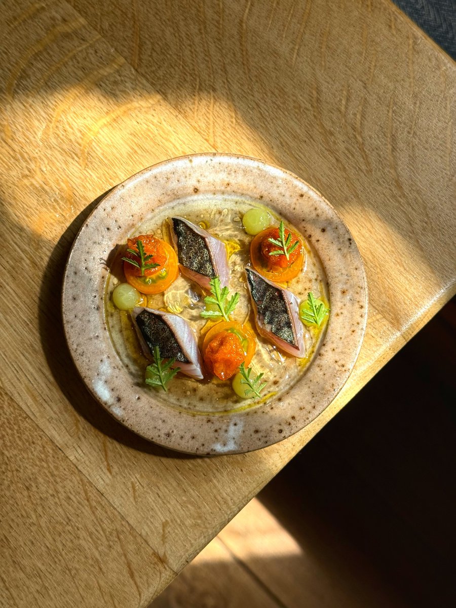 Sungold tomatoes from our garden at The Black Swan at Oldstead, served with lightly salted Mackerel and finished with a tomato water and elderflower dressing.