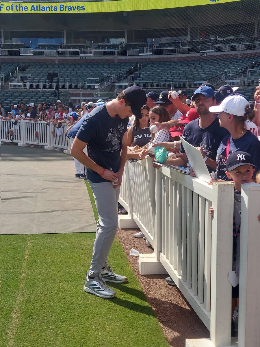This guy look familiar to y'all? 😉

(He's signing autographs for just about all the fans down on the field who want one. Good dude!)