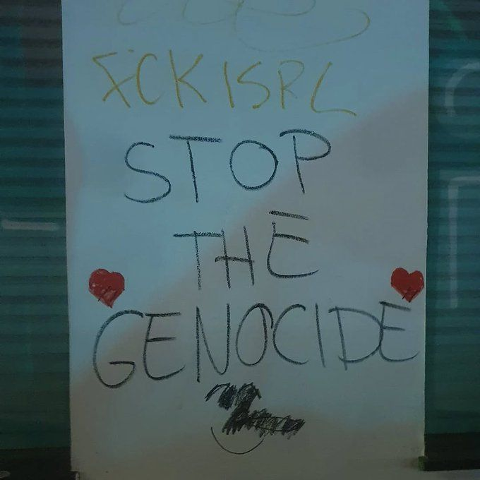 "Stop the genocide!"  

Spotted in Berlin, Germany