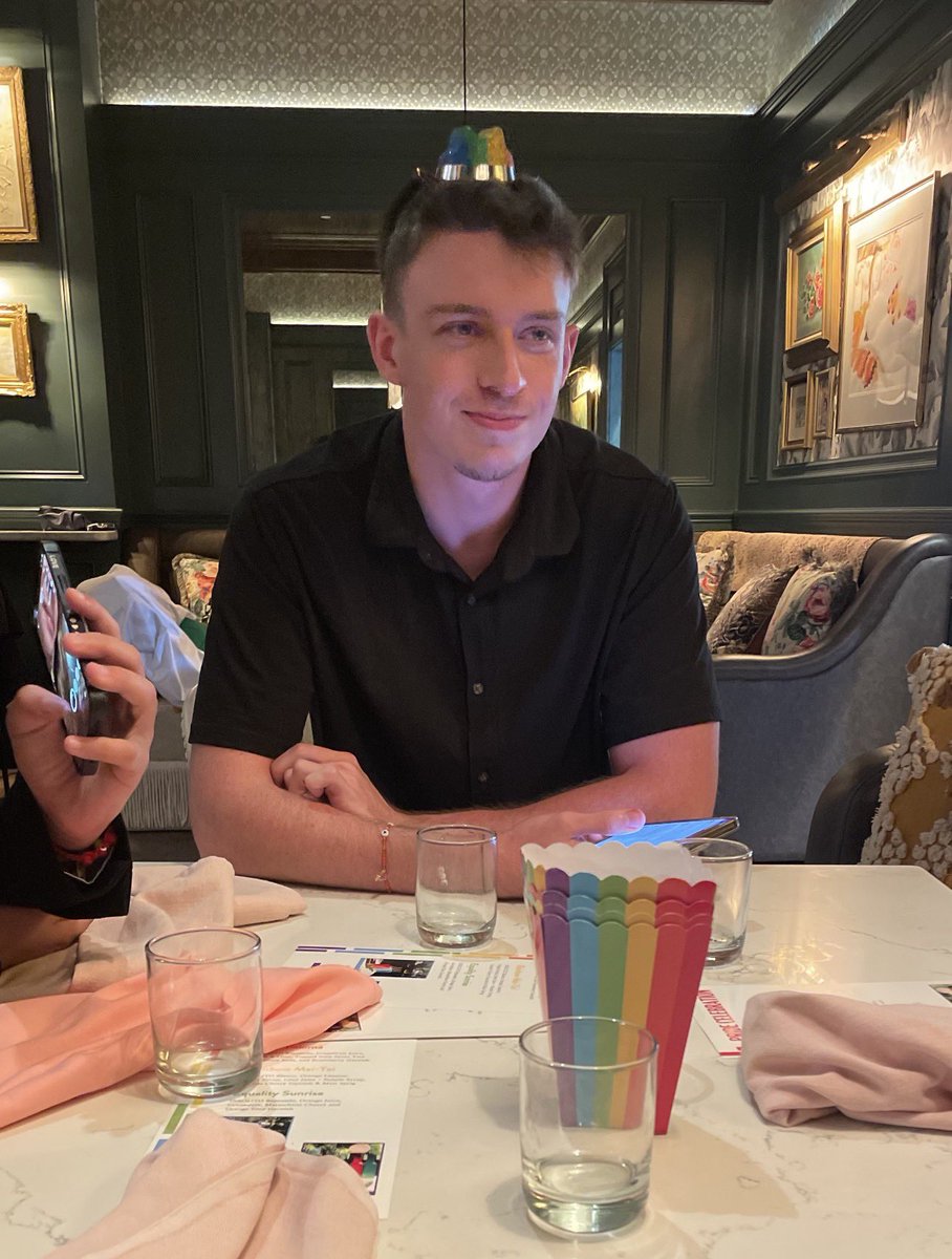 russianbikerr's tweet image. i’m still here at the restaurant (with a tiny rainbow cowboy hat on)