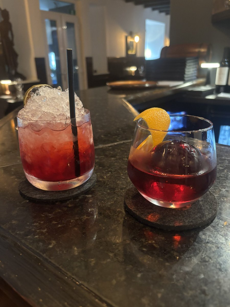 JudyMurray's tweet image. Elderflower Negroni meets Highland Bramble on the counter of the cocktail bar at Edinbane Lodge on the Isle of Skye. And canapés to die for. A very special place to eat and drink on the Isle of Skye 🏴 @EdinbaneLodge @VisitScotland