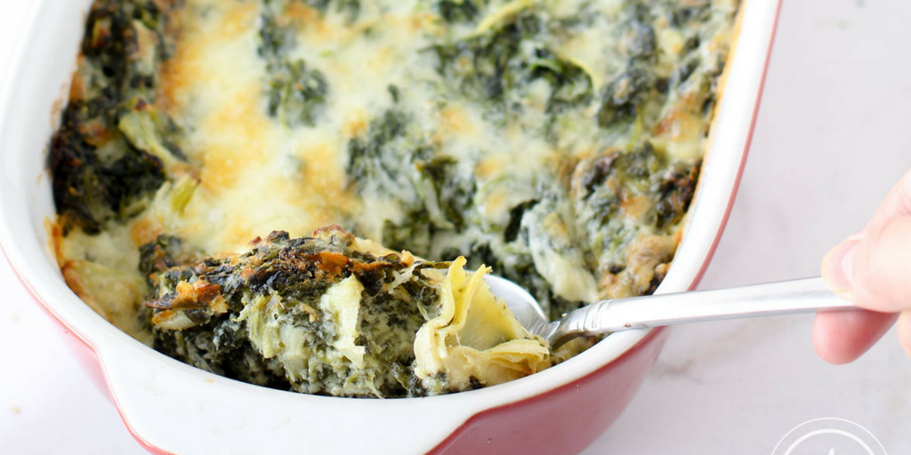 Creamy, cheesy healthy spinach artichoke dip is a go-to crowd-pleasing appetizer with extra veggies and fewer calories.  bit.ly/3QinPE8