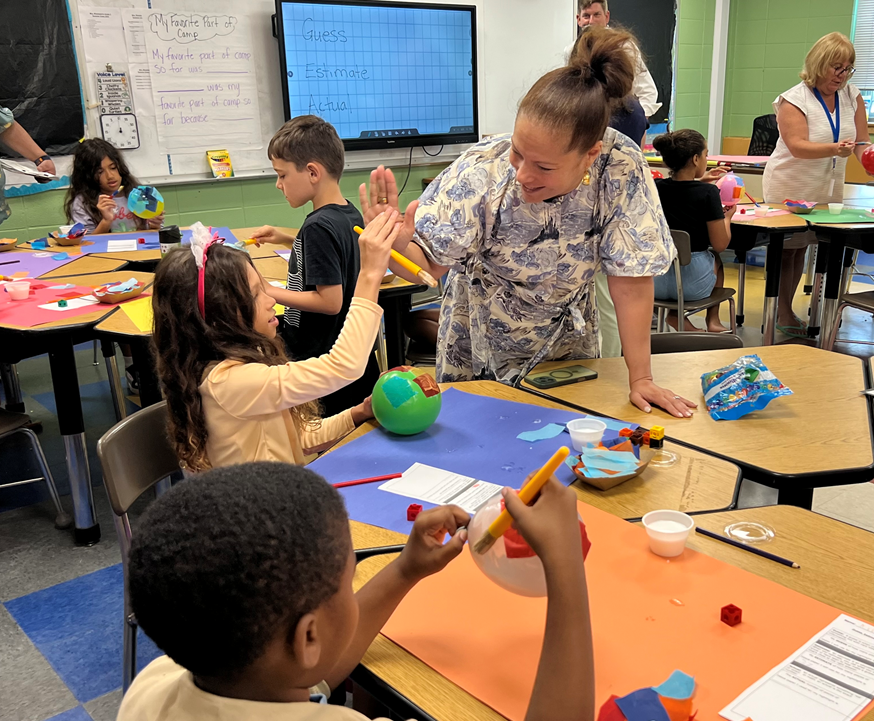 RIDeptEd's tweet image. Our #SummerLearningWeek celebration continues! Commissioner @AInfanteGreen stopped by @JHGaudetMiddle1 for the Middletown Child Opportunity Zone Summer Enrichment Camp. This #Learn365RI & #MathMattersRI program uses hands-on activities to help students solve problems critically.