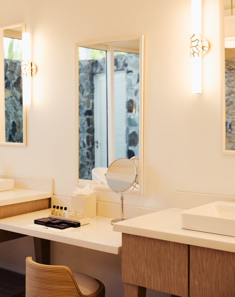 Spacious, modern, and thoughtfully designed. Our Ocean Point Residence bathrooms feature double vanities, walk-in rain showers, natural stone finishes, and spa-inspired lighting, these private spaces are perfect for unwinding after a day in the sun. #MyWJL