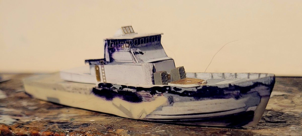 A little more headway on the 1/350 scale USCG Island class cutter master.  The flying bridge windscreen is up. 
Application of superstructure P/E details continue....