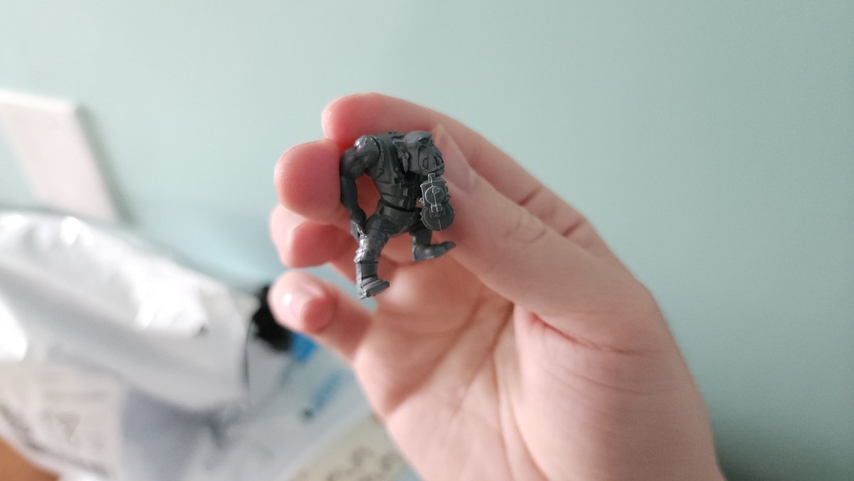sparkie237's tweet image. gave my friebd a pack of Orks as a gift, and the first thing he did was make one thats scratching its ass.