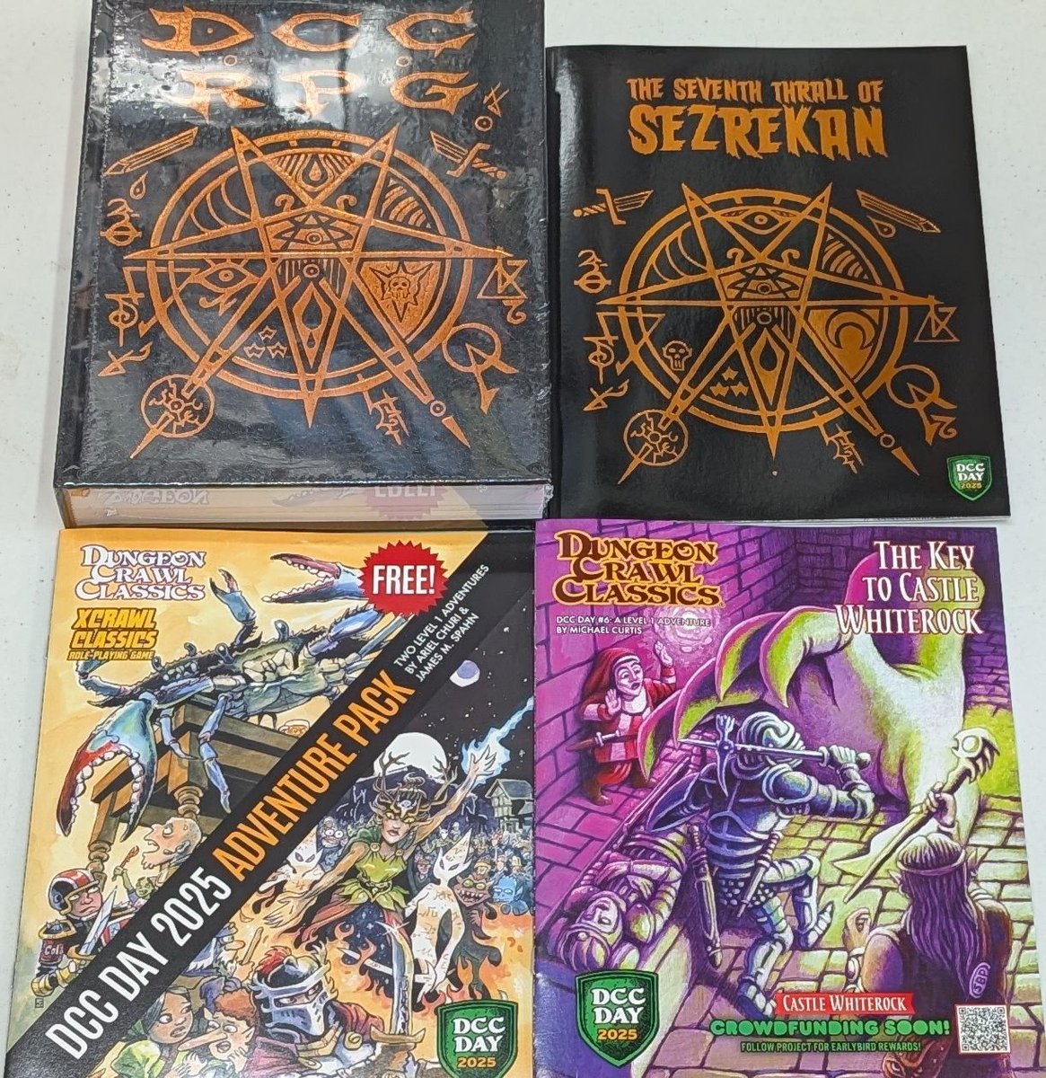 TychesGames's tweet photo. Some of the exciting Dungeon Crawl Classics stuff for #DCC Day Tomorrow!  Come and get you dungeon on!  DCC adventure at 4pm.

#RPGs #TTRPGs #FRPGs #MCC #XCC #GoodmanGames #DCCDay #AthensGA https://t.co/pQe1xHY57j
