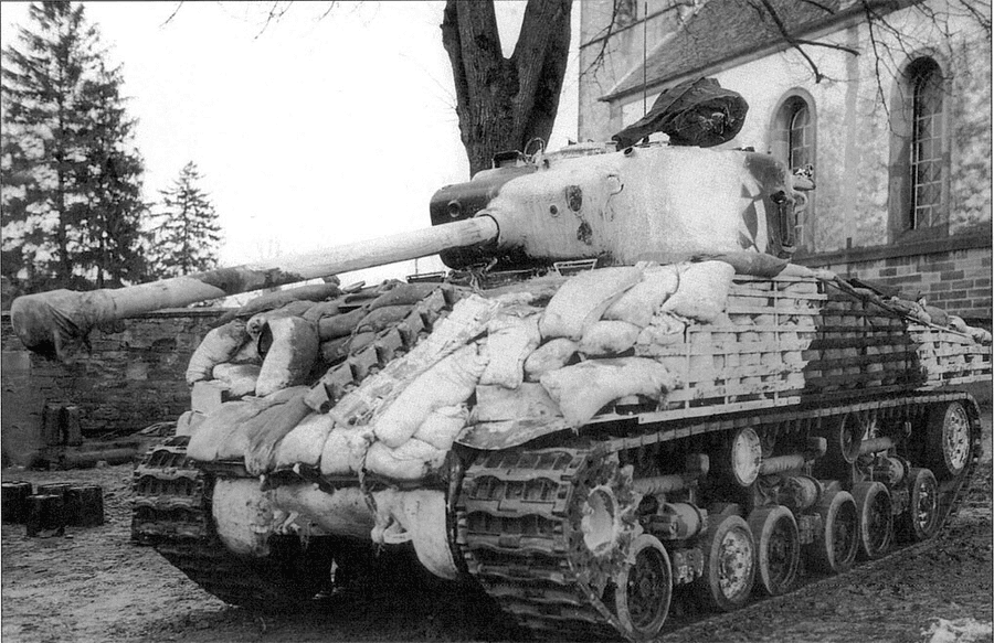 #OTD in 1944 a Canadian intelligence summary described improvised anti-Panzerfaust armour used in the field. A layer of sandbags over the main armour covered with sheet metal was the most effective, but a wide variety of other methods were also used. #tanks #history #WW2 #WWII