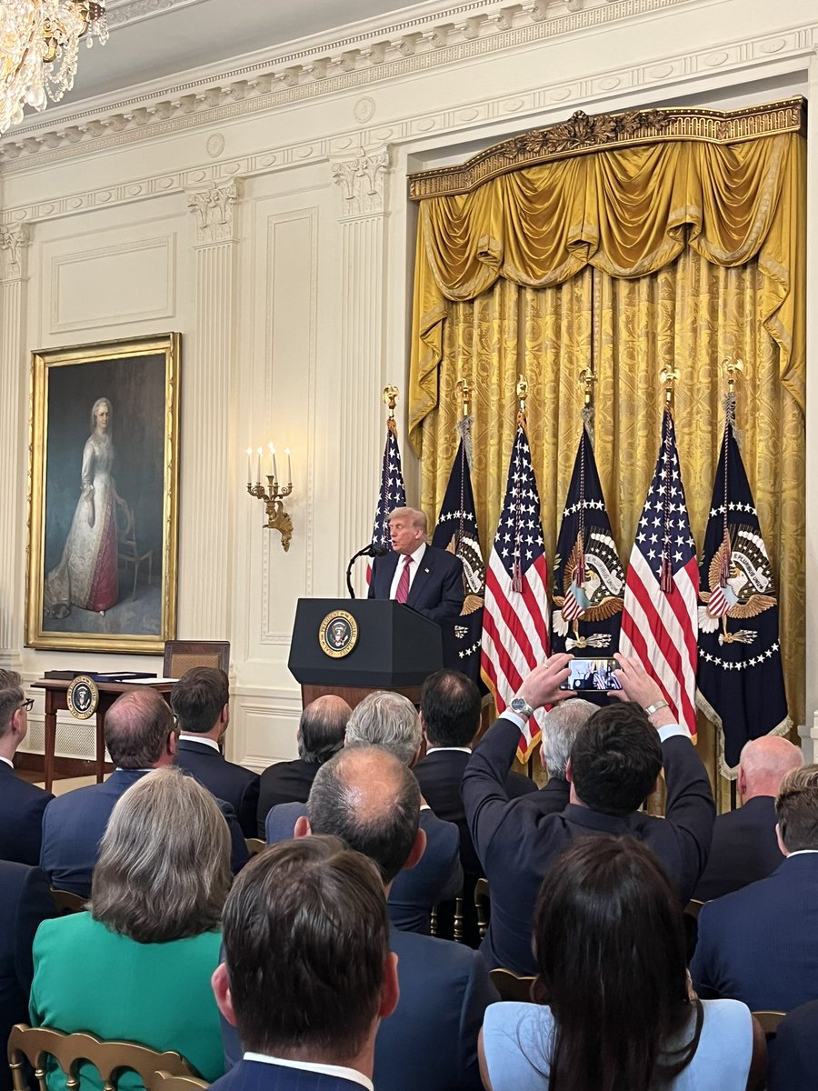 seungminkim's tweet image. Trump, at signing for cryptocurrency bill, jokes that “the genius act, they named it after — me.”