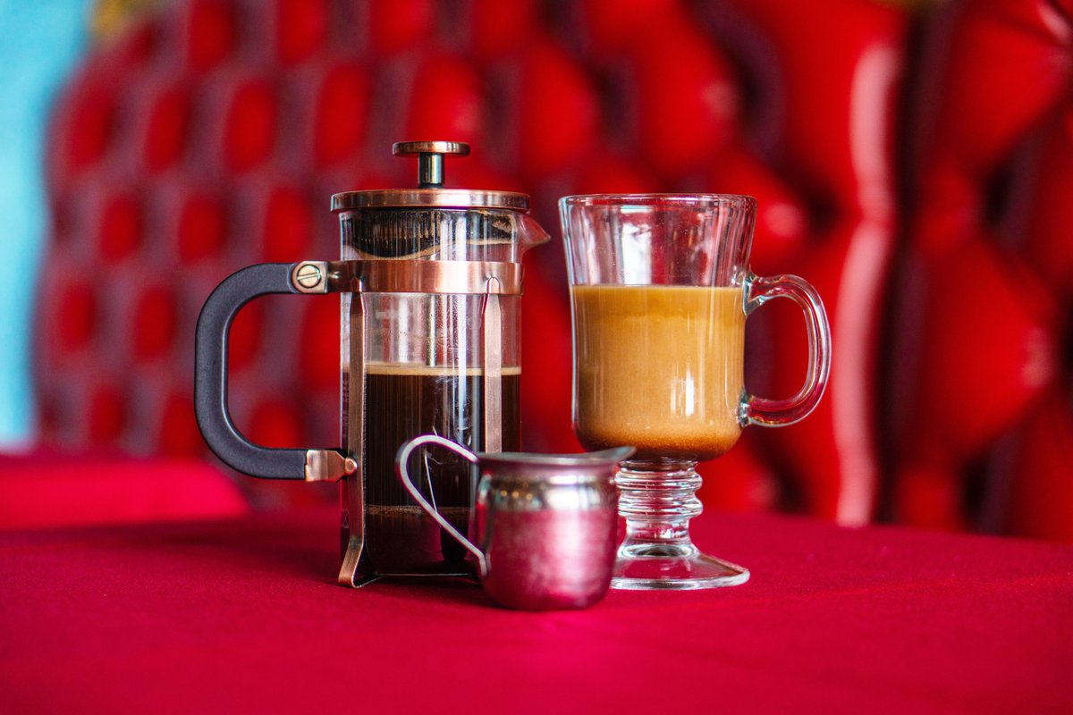 French Press coffee hits different in velvet seats. ☕