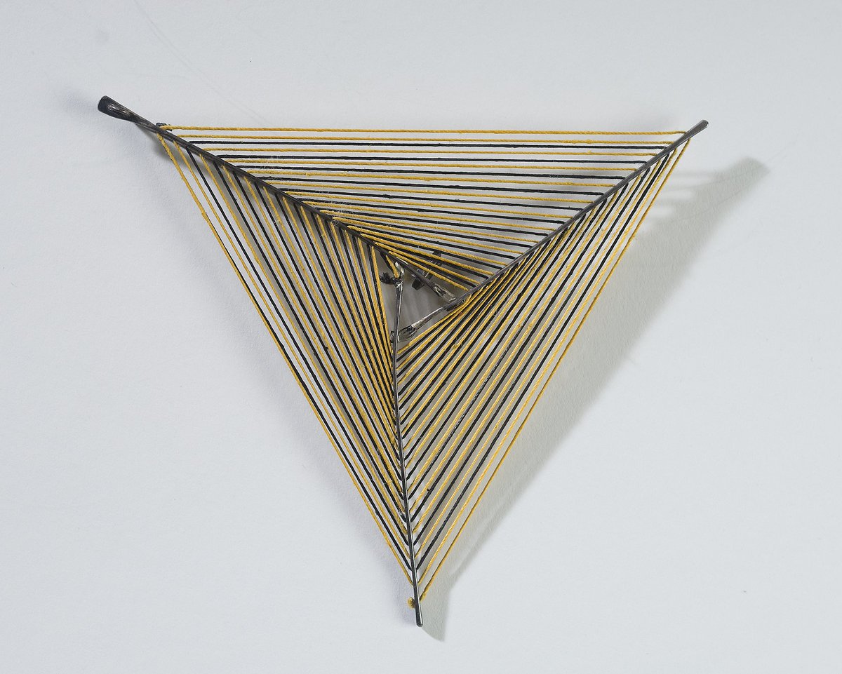 Bertoia's handcrafted #jewelry, both #modernist and timeless, was created mostly in the mid 1940s out of various metals, and even cotton thread. These two gorgeous pieces belong to relatives. The left one came in the 1970s to be produced in quantity but Harry died too soon.