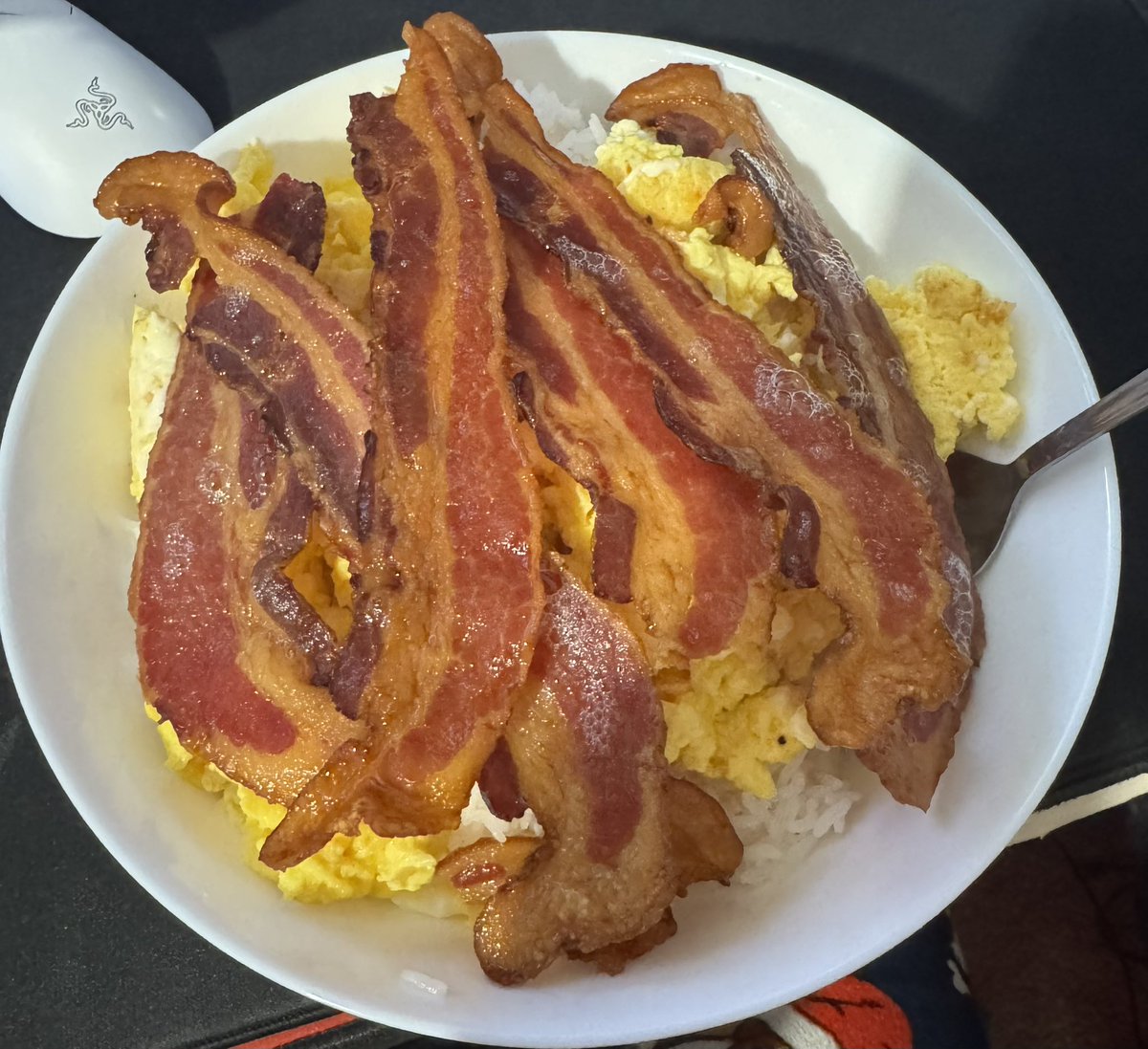 if this isn’t the most college breakfast ever idk what is, just a bowl of rice, eggs, and bacon